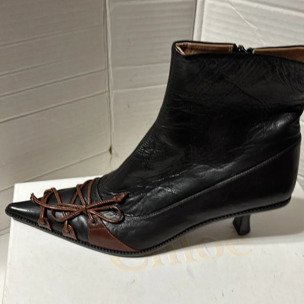 Elegant Black Ankle Boots with Brown Accents - Picture 6 of 13